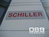 SCHILLER München: Schilder ohne Sichtbare Befestigung.