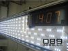 Sonderanfertigung für den Flugafen München : Leuchtkasten mit LED - Technik und integrierter Uhr