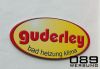 Fa. Guderley Showroom - Beschriftung, oval formgeschnitten mit Digitaldruck schutzlaminiert beschriftet, zur Wandmontage auf Alurahmen, von 089Werbung M�nchen.