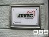 Firmenschild auf Edelstahlrahmen Fa. ARTEC in M�nchen, mit Digitaldruck UV best�ndig auf Acryl 8mm zur Wandmontage, von 089Werbung M�nchen.